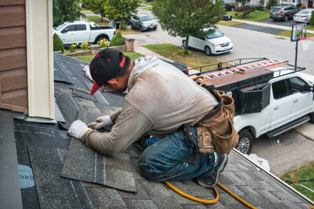 Professional Roofing technician working in Coloma, MI